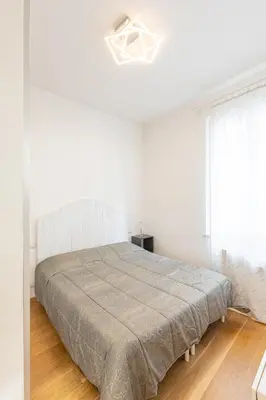 Letto o letti in una camera di Molinari House Diamond - Appartamento Raffinato in centro Modena - Free ZTL