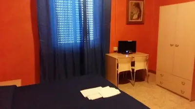 Letto o letti in una camera di Hotel Violetta