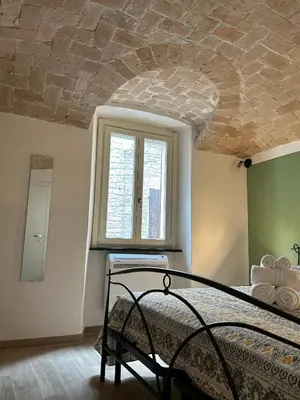 Letto o letti in una camera di Guest House il Il Podestà