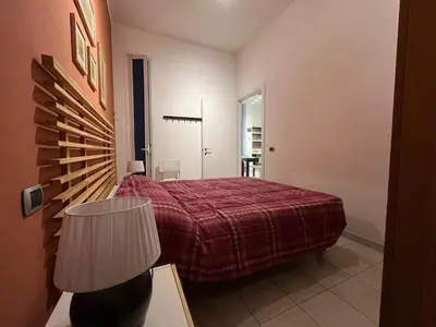 Letto o letti in una camera di LA CASA DEI POPPI