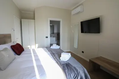 Letto o letti in una camera di B&B Residenza Alba Chiara