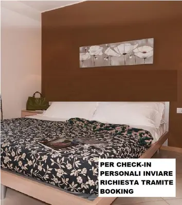 Letto o letti in una camera di residence 12,30