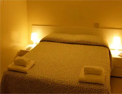 Letto o letti in una camera di affitti ONLY SLEEP bagno privato
