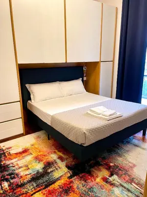 Letto o letti in una camera di 149 BORGO TICINO SUITE Attico di Lusso con Terrazzo e Parking Privato