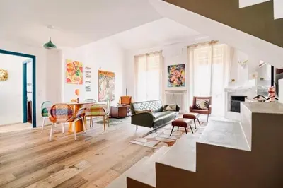 Area soggiorno di 149 BORGO TICINO SUITE Attico di Lusso con Terrazzo e Parking Privato