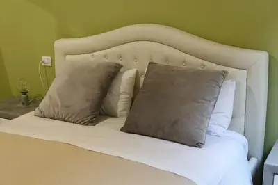 Letto o letti in una camera di Armonia e Piaceri