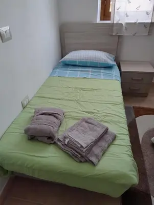 Letto o letti in una camera di Conchiglia Magica Albiano Magra - Lunigiana