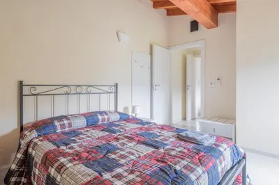 Letto o letti in una camera di Il Palazzo Chiesanuova