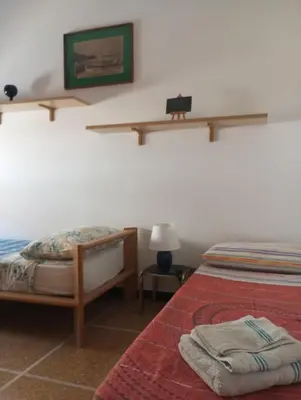 Letto o letti in una camera di Tigullio Vacations - Da Gabriella