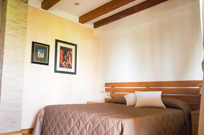 Letto o letti in una camera di Rustic Parma Retreat