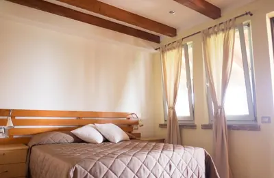 Letto o letti in una camera di Rustic Parma Retreat