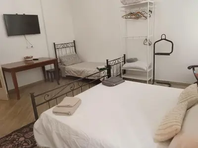 Letto o letti in una camera di Casa Artemisia lungo il fiume con giardino privato