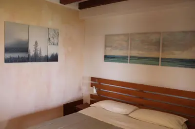 Letto o letti in una camera di Parma Country Room