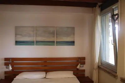 Letto o letti in una camera di Parma Country Room