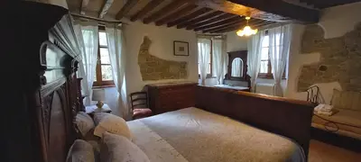 Letto o letti in una camera di B&B CorteBonomini entire home