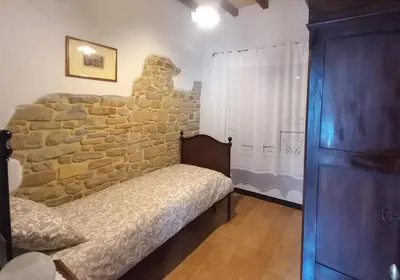 Letto o letti in una camera di B&B CorteBonomini entire home