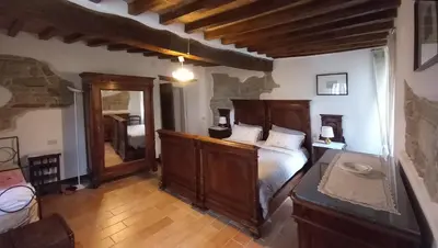 Letto o letti in una camera di B&B CorteBonomini entire home