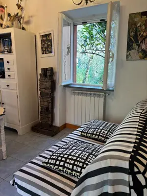 Letto o letti in una camera di La Gaiada