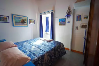 Letto o letti in una camera di La Gaiada