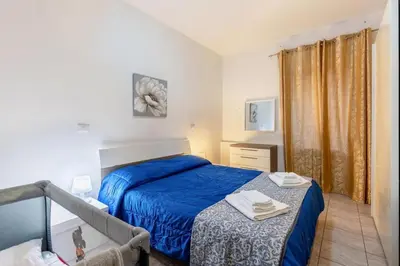 Letto o letti in una camera di Genysweethome