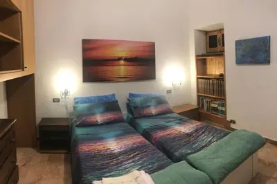 Letto o letti in una camera di La Finestra sul Mare a Drignana (5Terre, Vernazza)