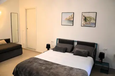 Letto o letti in una camera di Pae veciu camera privata con bagno
