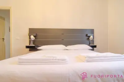 Letto o letti in una camera di FuoriPorta Affitti Brevi - Casa di Susanna