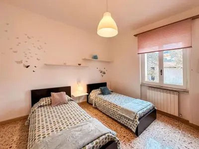Letto o letti in una camera di [5 TERRE]The Terrace on the Gulf - Parking / Wi-fi