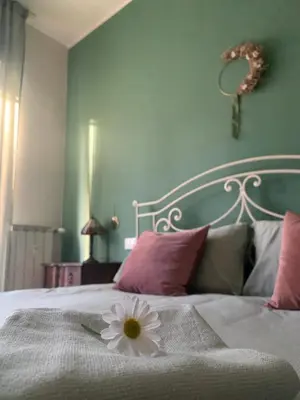 Letto o letti in una camera di La Finestra sul Parco