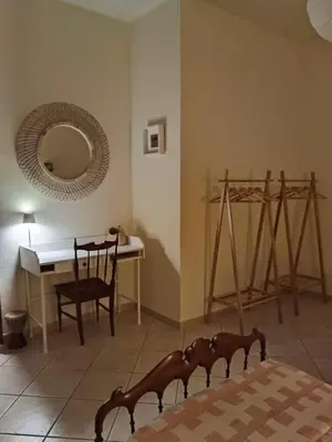 Letto o letti in una camera di La Finestra sul Parco