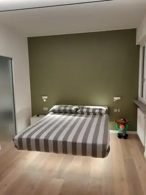 Letto o letti in una camera di Monolocale Cairoli 18