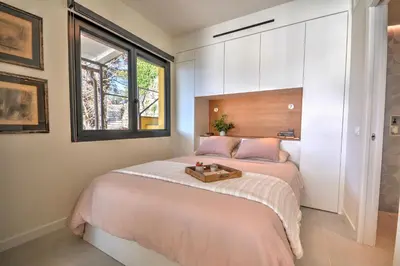 Letto o letti in una camera di Penthouse Marina di Bardi - Attico con vista mozzafiato su Portofino e terrazza privata