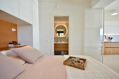 Letto o letti in una camera di Penthouse Marina di Bardi - Attico con vista mozzafiato su Portofino e terrazza privata