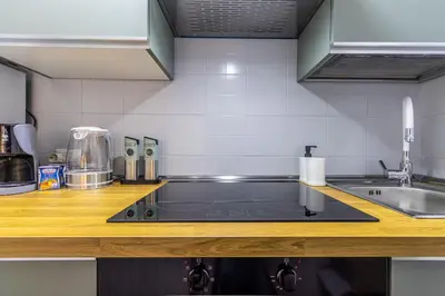 Cucina o angolo cottura di Ottonelli Street Stay- WiFi Fibra free tra Storchi & Centro Storico