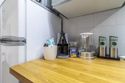 Cucina o angolo cottura di Ottonelli Street Stay- WiFi Fibra free tra Storchi & Centro Storico