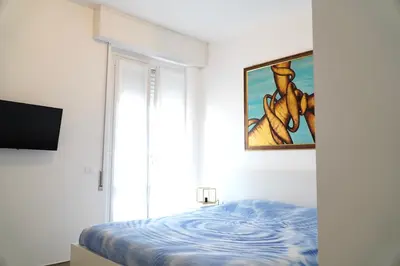 Letto o letti in una camera di Turchese Sestri Levante