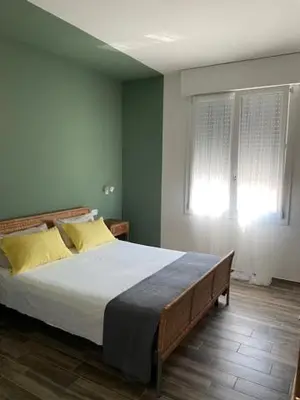 Letto o letti in una camera di B&B IL CEDRO