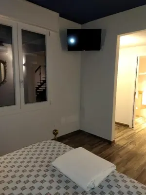 Letto o letti in una camera di B&B IL CEDRO