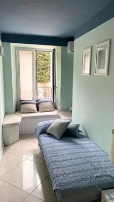 Letto o letti in una camera di A casa di Emma (camera Levante)