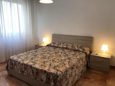 Letto o letti in una camera di Three rooms close to the sea and services