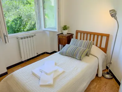 Letto o letti in una camera di Casa Marcella