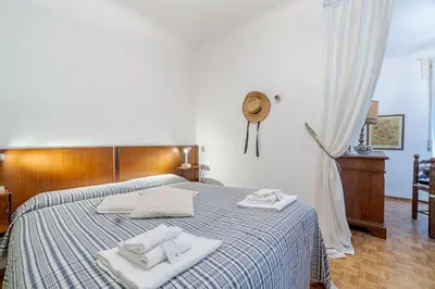 Letto o letti in una camera di GuestHost - Vintage Holiday Flat