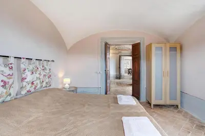 Letto o letti in una camera di AFFRESCATO - Palazzo Ravaschieri
