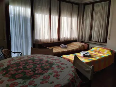 Letto o letti in una camera di Le Caravelle a 150 MT a piedi dalle spiagge