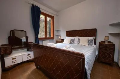 Letto o letti in una camera di 229 - Casa di Magda - Moneglia, 5minuti a piedi dal mare e spiaggia - PARCHEGGIO PRIVATO INCLUSO