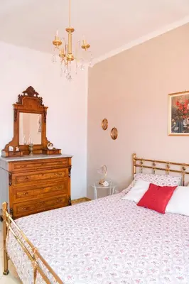 Letto o letti in una camera di Casa di Paola