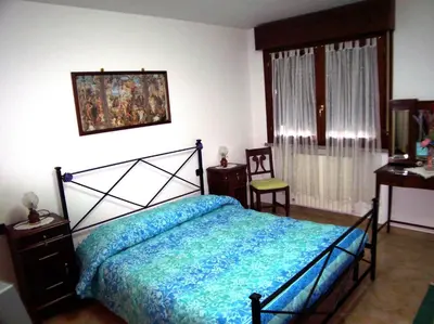 Letto o letti in una camera di B&B Il Parco