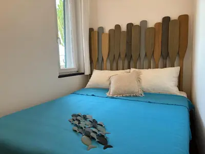 Letto o letti in una camera di Villa Marta