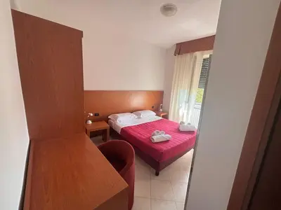 Letto o letti in una camera di Il Rampicante-Monticelli Terme