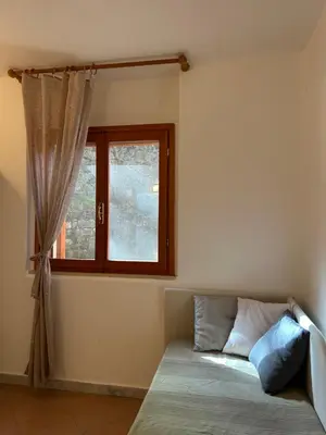 Letto o letti in una camera di La Casetta